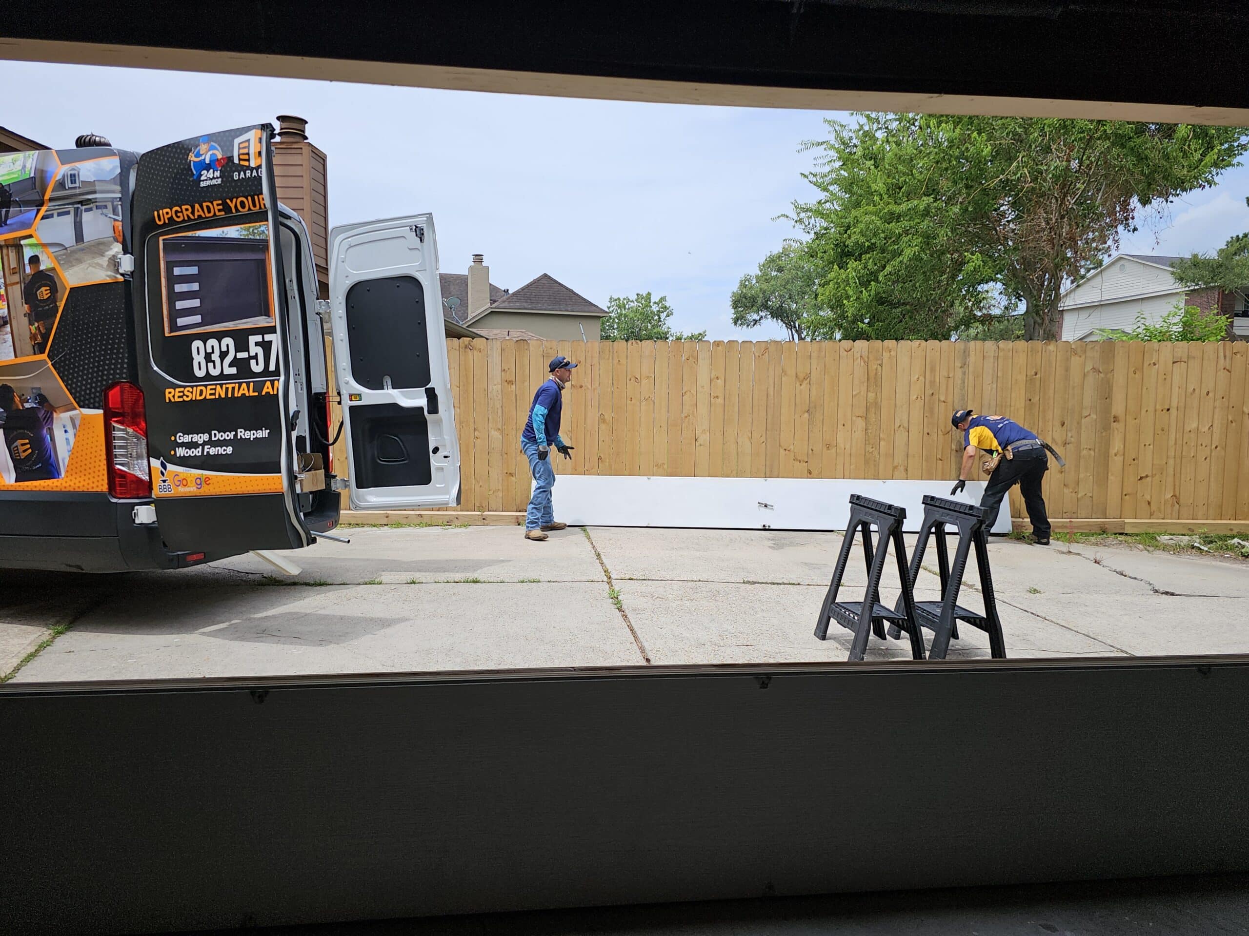 Custom wood garage door repair in Tanglewood Houston 77056