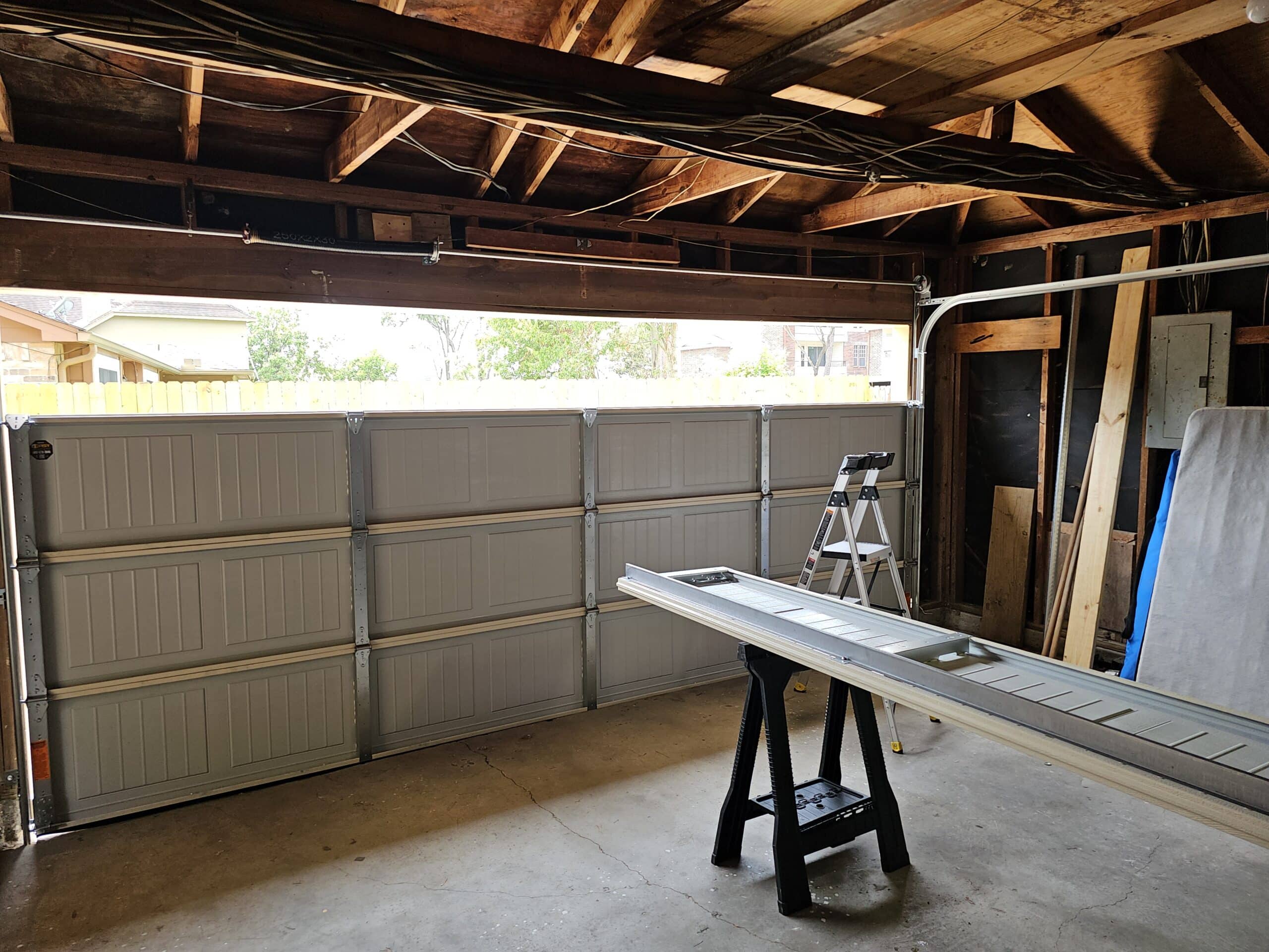 Meyerland garage door restoration near Brays Bayou