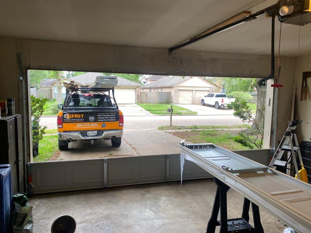 Garage Door Panel Replacement – Damaged Bottom Panel Repaired on Fall River Rd, Houston, TX