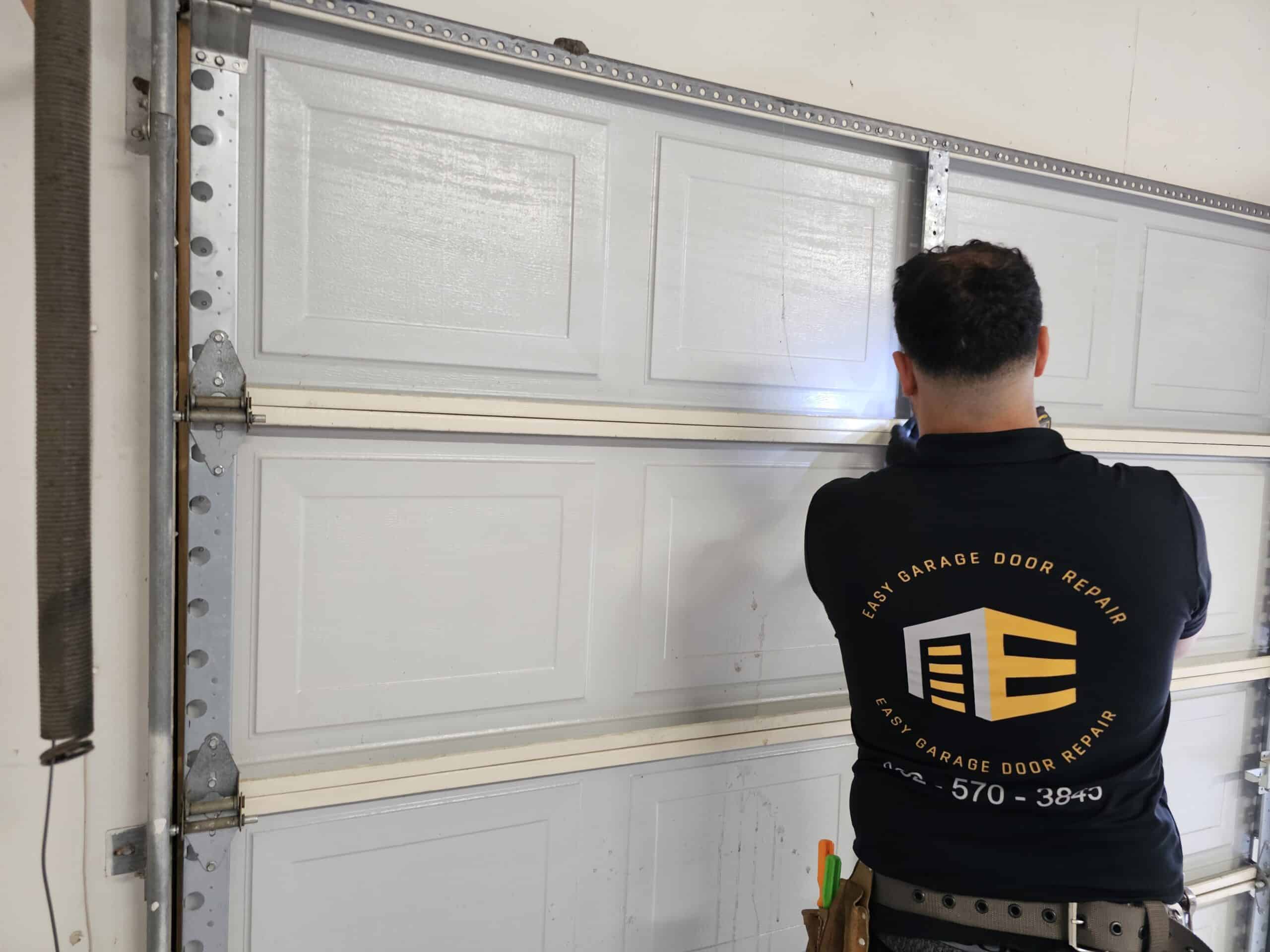 Garage Door Repair – Panel Hinge Realignment on Potomac Dr, Houston, TX